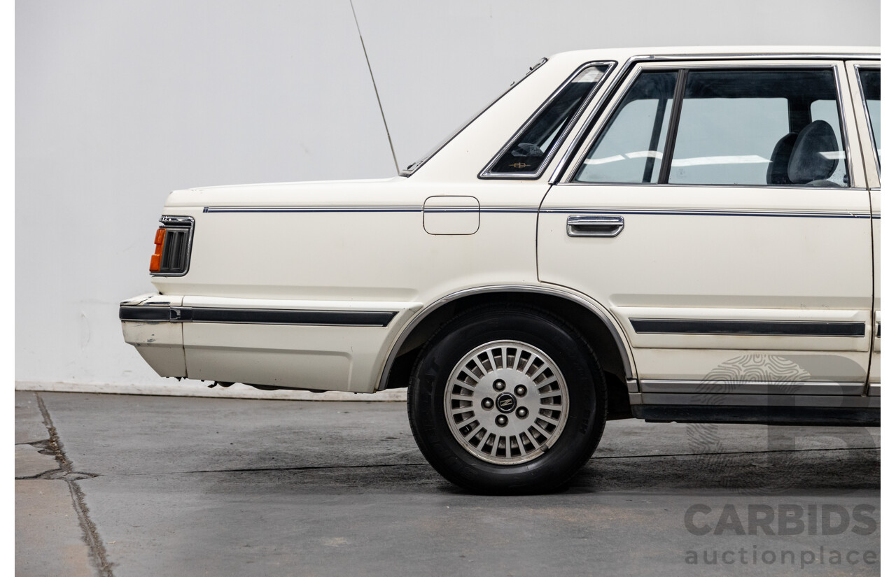 1/1985 Nissan 300 C (Cedric) PY30 4d Sedan White 3.0L