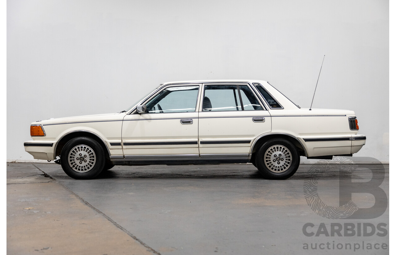 1/1985 Nissan 300 C (Cedric) PY30 4d Sedan White 3.0L