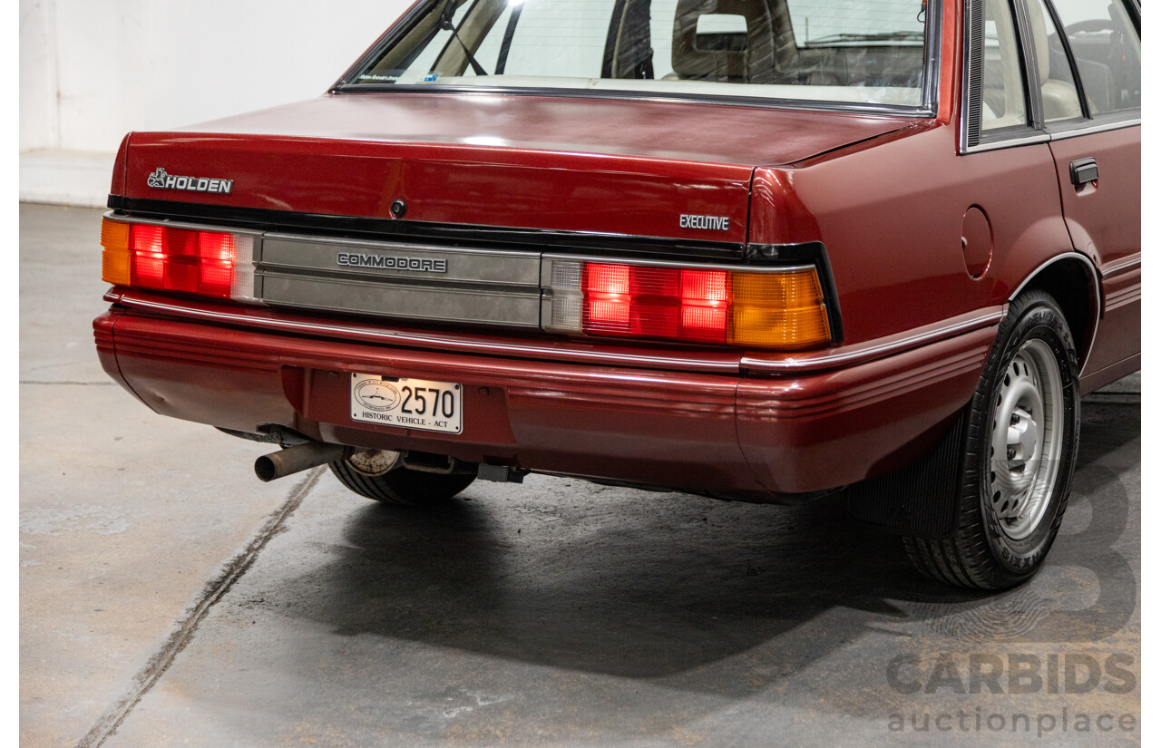 5/1988 Holden Commodore SL Executive VL BT-1 4d Sedan Venetian Red 3.0L - Ex-NSW Police