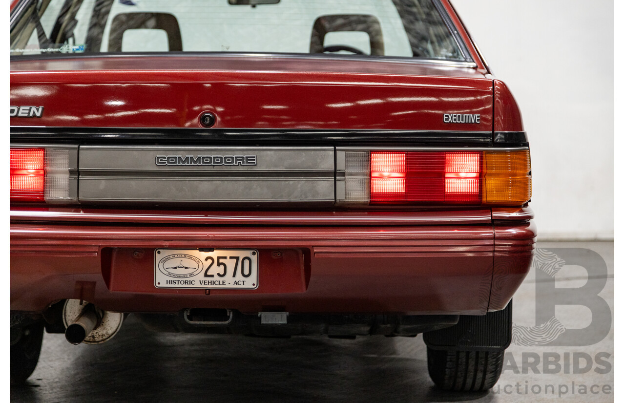 5/1988 Holden Commodore SL Executive VL BT-1 4d Sedan Venetian Red 3.0L - Ex-NSW Police