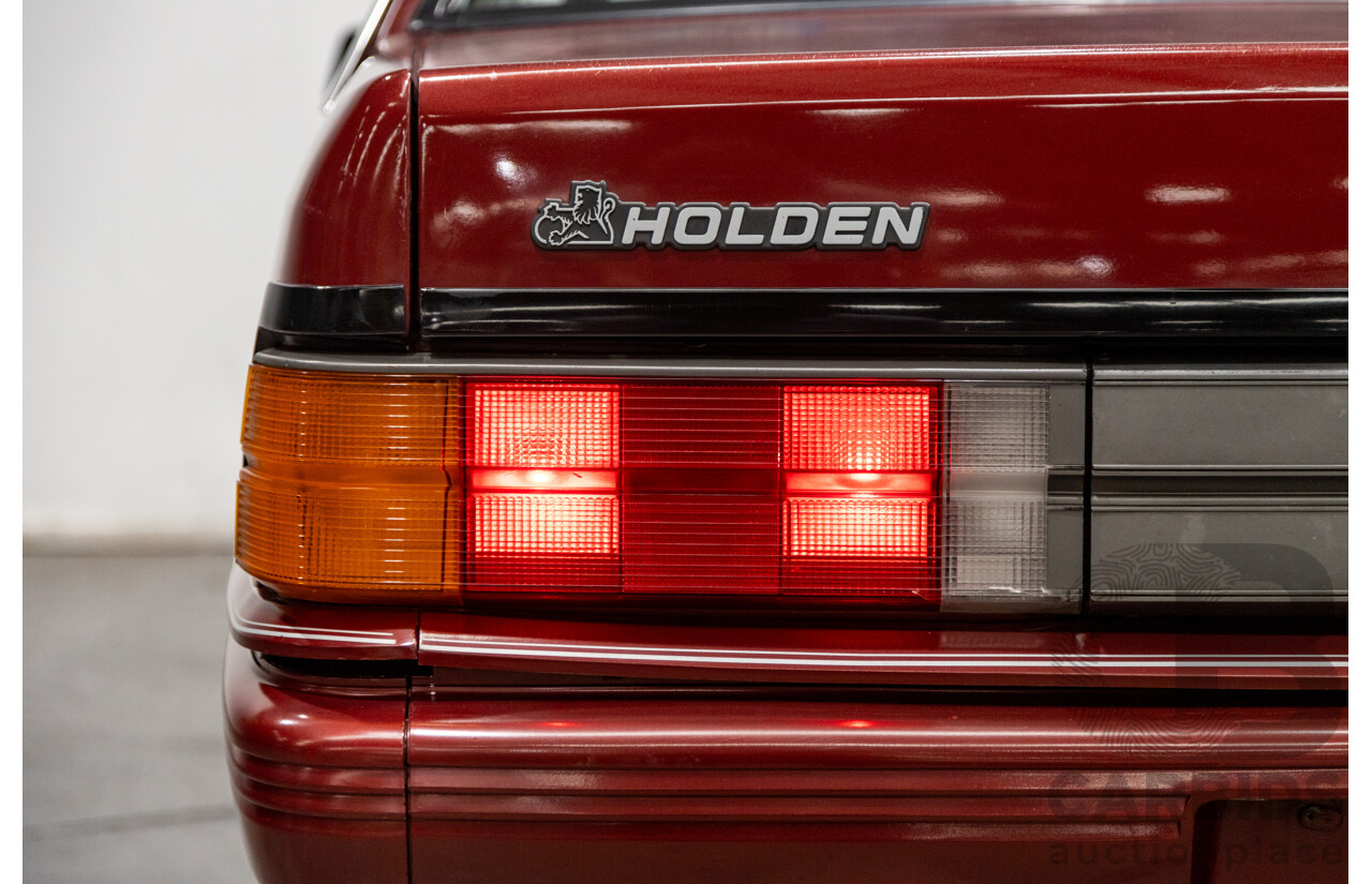 5/1988 Holden Commodore SL Executive VL BT-1 4d Sedan Venetian Red 3.0L - Ex-NSW Police