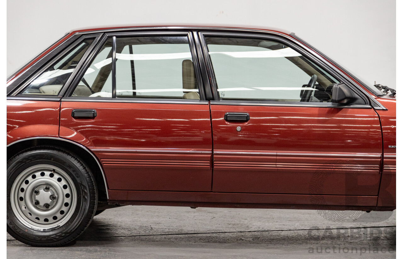 5/1988 Holden Commodore SL Executive VL BT-1 4d Sedan Venetian Red 3.0L - Ex-NSW Police