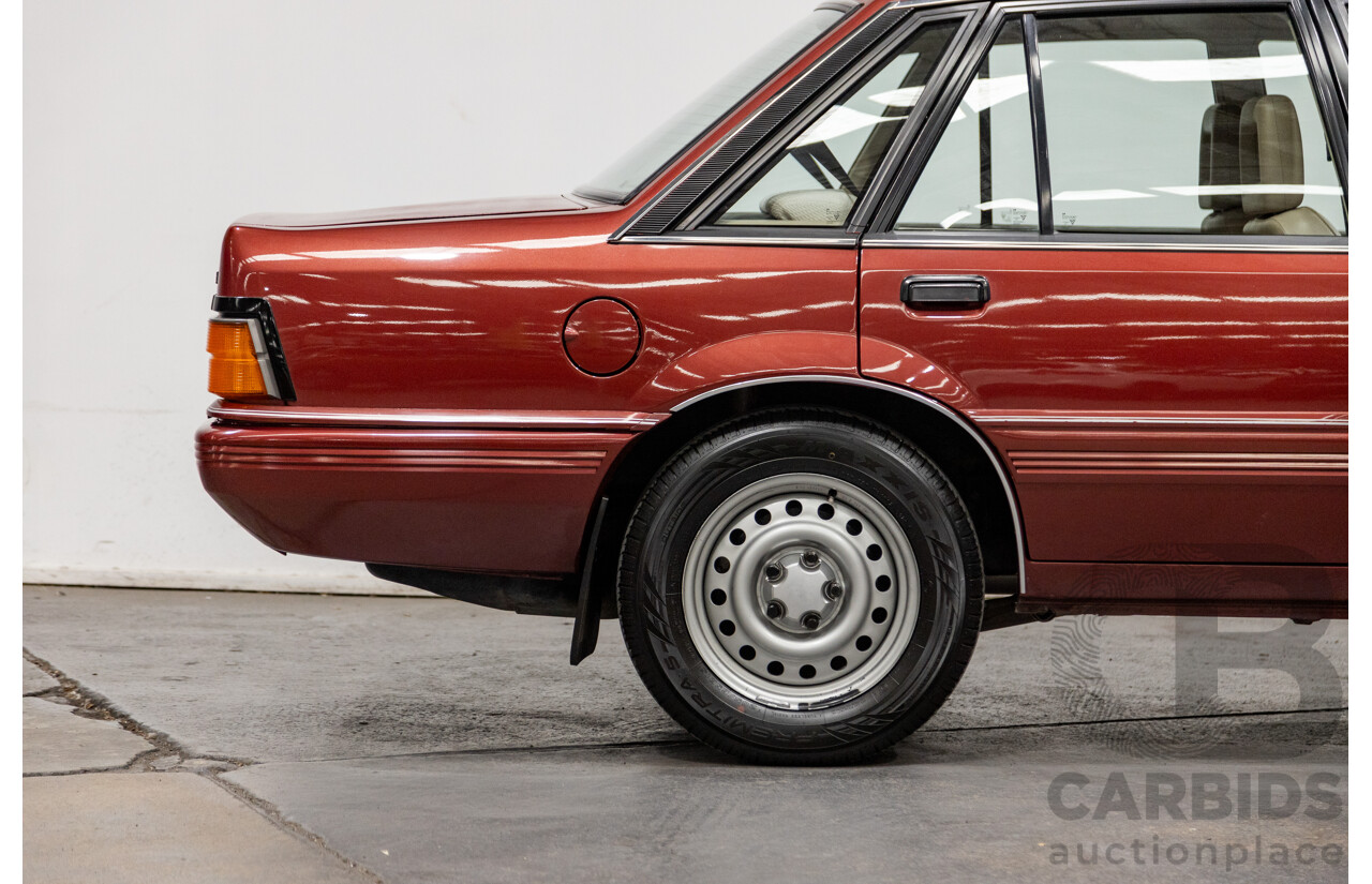 5/1988 Holden Commodore SL Executive VL BT-1 4d Sedan Venetian Red 3.0L - Ex-NSW Police