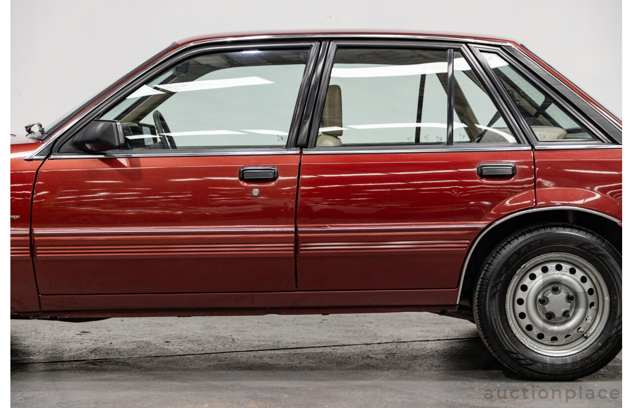 5/1988 Holden Commodore SL Executive VL BT-1 4d Sedan Venetian Red 3.0L - Ex-NSW Police