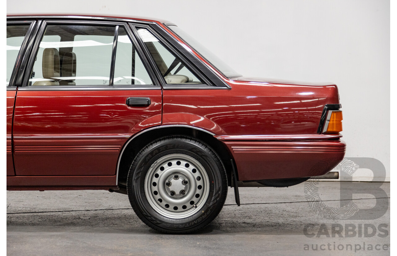 5/1988 Holden Commodore SL Executive VL BT-1 4d Sedan Venetian Red 3.0L - Ex-NSW Police