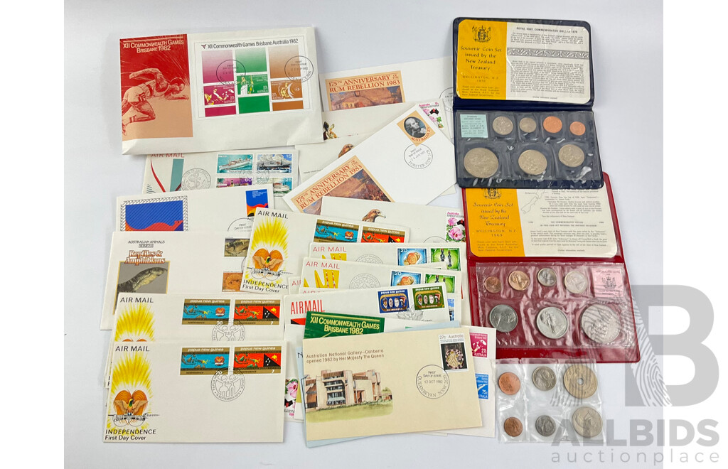 Collection of PNG, Australia First Day Covers with New Zealand RAM 1969, 1970 and PNG 1975 UNC Coin Sets