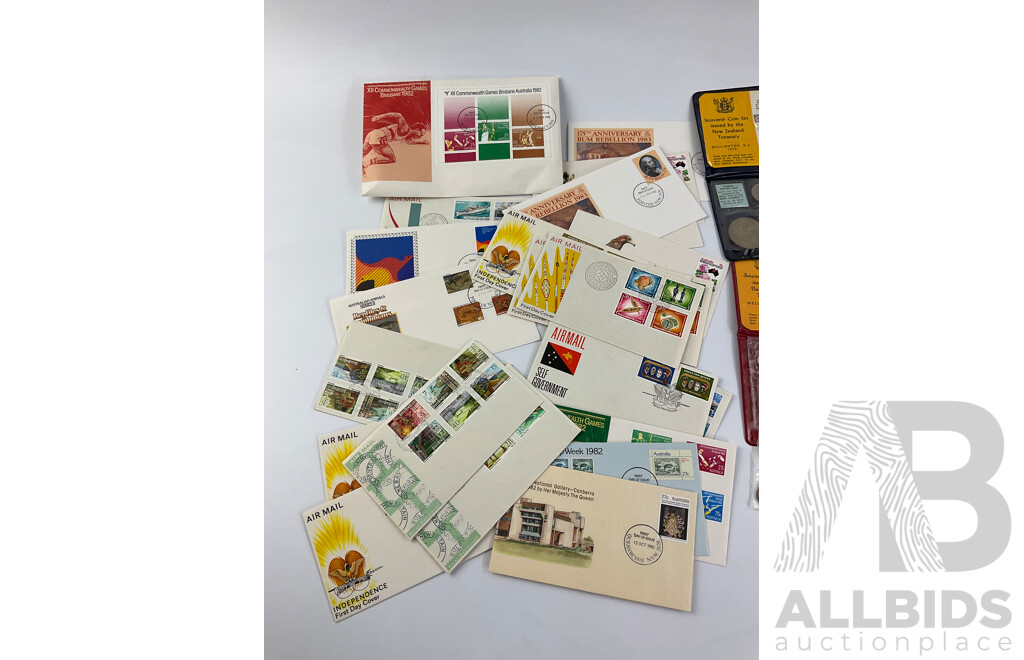 Collection of PNG, Australia First Day Covers with New Zealand RAM 1969, 1970 and PNG 1975 UNC Coin Sets