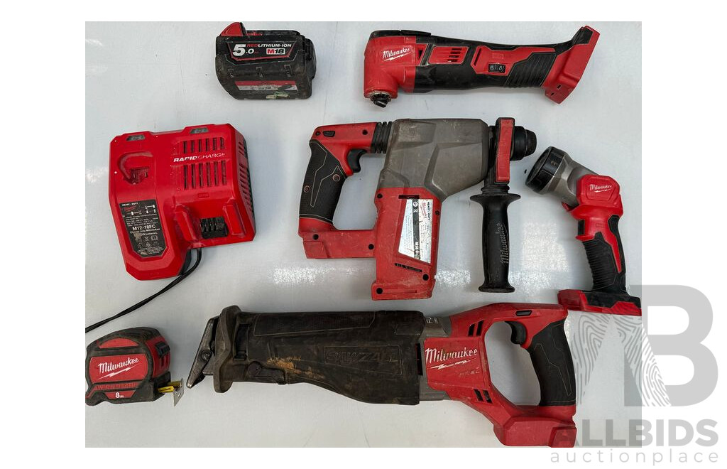 Milwaukee Tool Bag - Rapid Charger, Battery, Reciprocating Saw, Rotary Hammer, Multi-Tool, Tape Measurer and Work Light