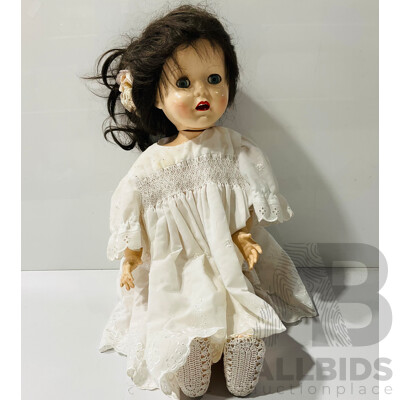 Vintage English-made Life Sized Blinking Baby Doll