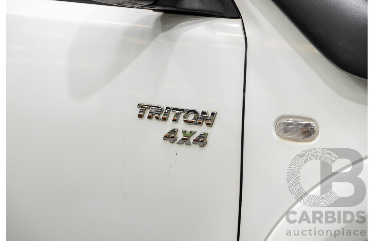 1/2013 Mitsubishi Triton GLX (4x4) MN MY13 Double Cab Utility White Turbo Diesel 2.5L