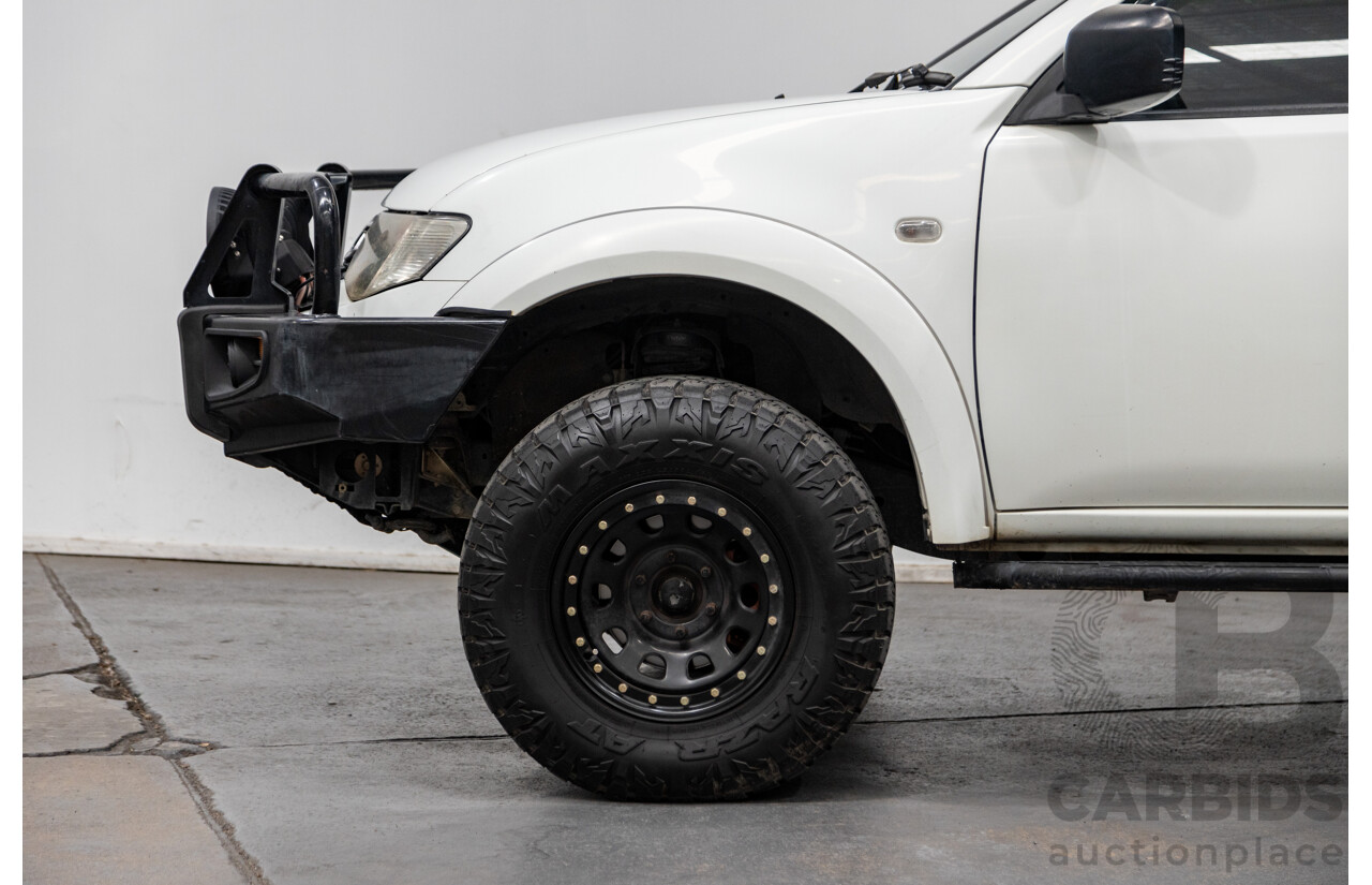 1/2013 Mitsubishi Triton GLX (4x4) MN MY13 Double Cab Utility White Turbo Diesel 2.5L