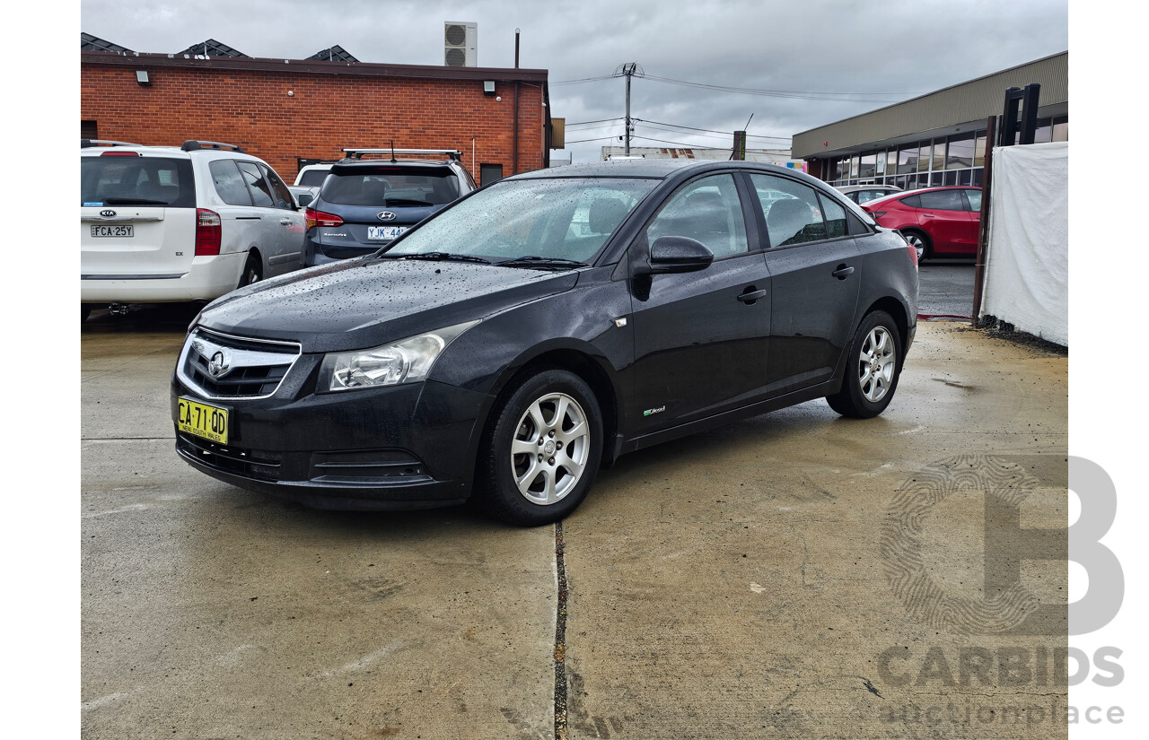 9/2010 Holden Cruze CD JG 4d Sedan Black 2.0L