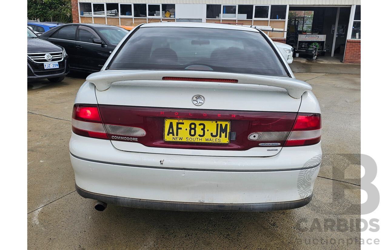 12/1999 Holden Commodore Acclaim VTII 4d Sedan White 3.8L