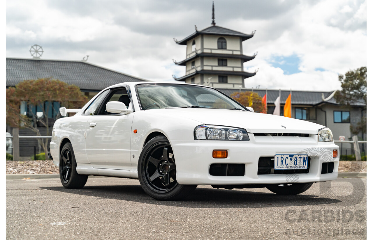 02/1999 Nissan R34 Skyline 25GT ER34 Series 1 2d Coupe QM1 White 2.5L - 04/2012 Import