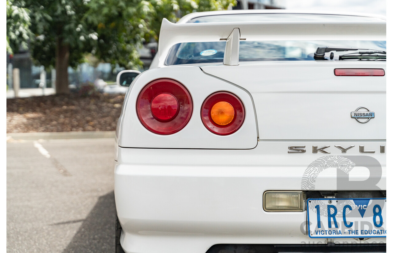 02/1999 Nissan R34 Skyline 25GT ER34 Series 1 2d Coupe QM1 White 2.5L - 04/2012 Import