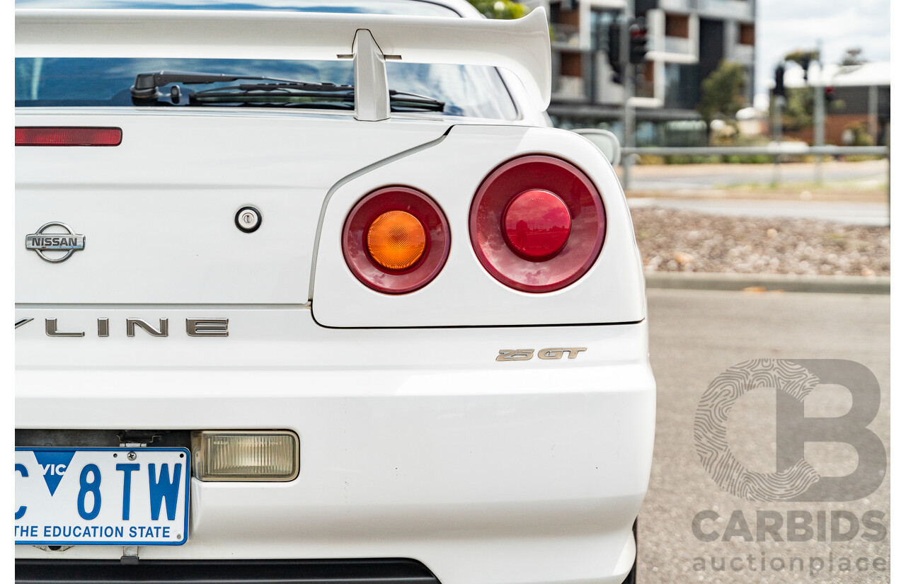 02/1999 Nissan R34 Skyline 25GT ER34 Series 1 2d Coupe QM1 White 2.5L - 04/2012 Import