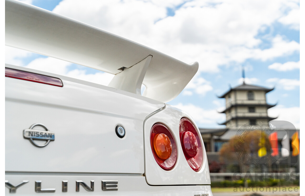 02/1999 Nissan R34 Skyline 25GT ER34 Series 1 2d Coupe QM1 White 2.5L - 04/2012 Import