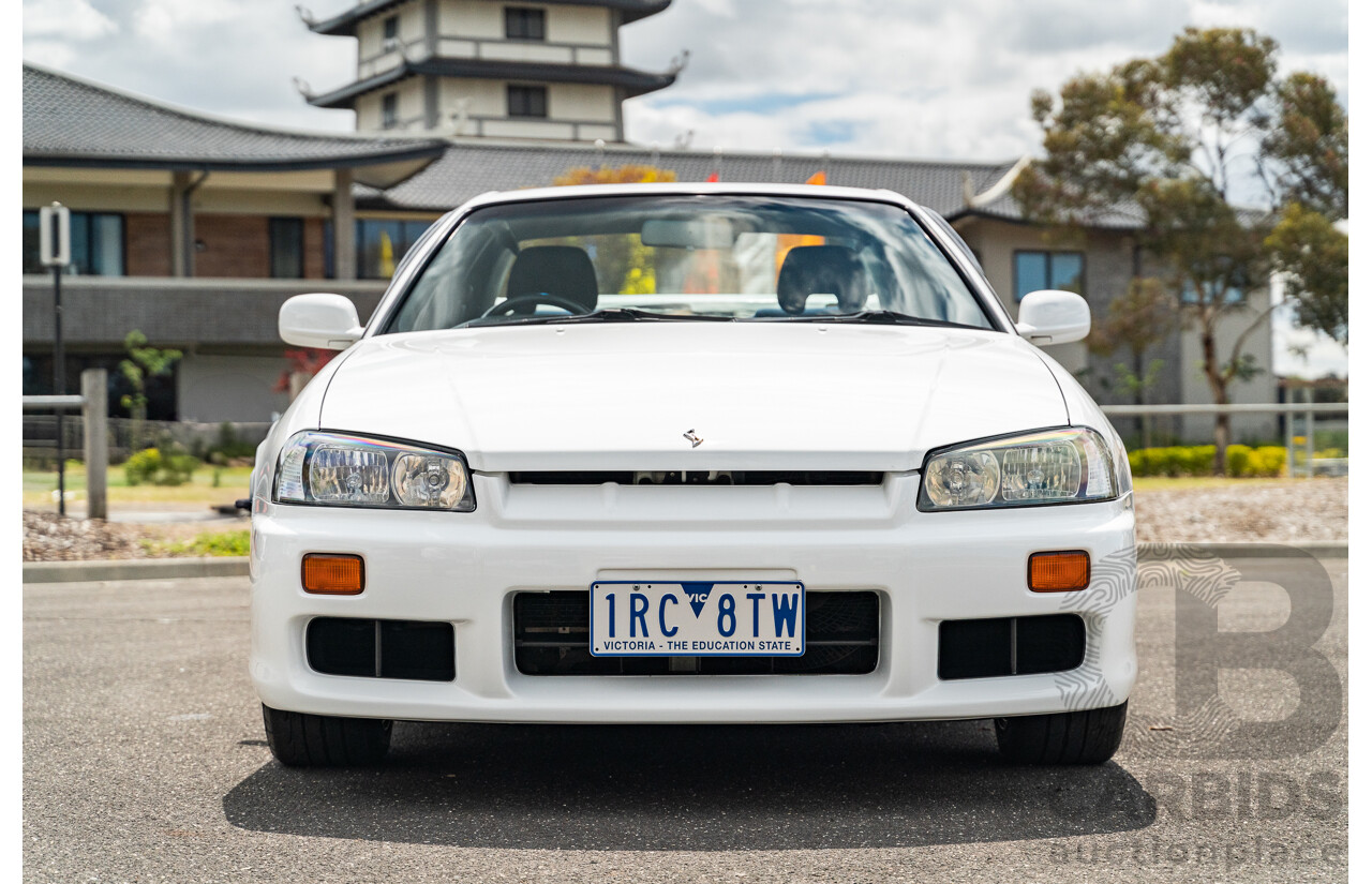 02/1999 Nissan R34 Skyline 25GT ER34 Series 1 2d Coupe QM1 White 2.5L - 04/2012 Import