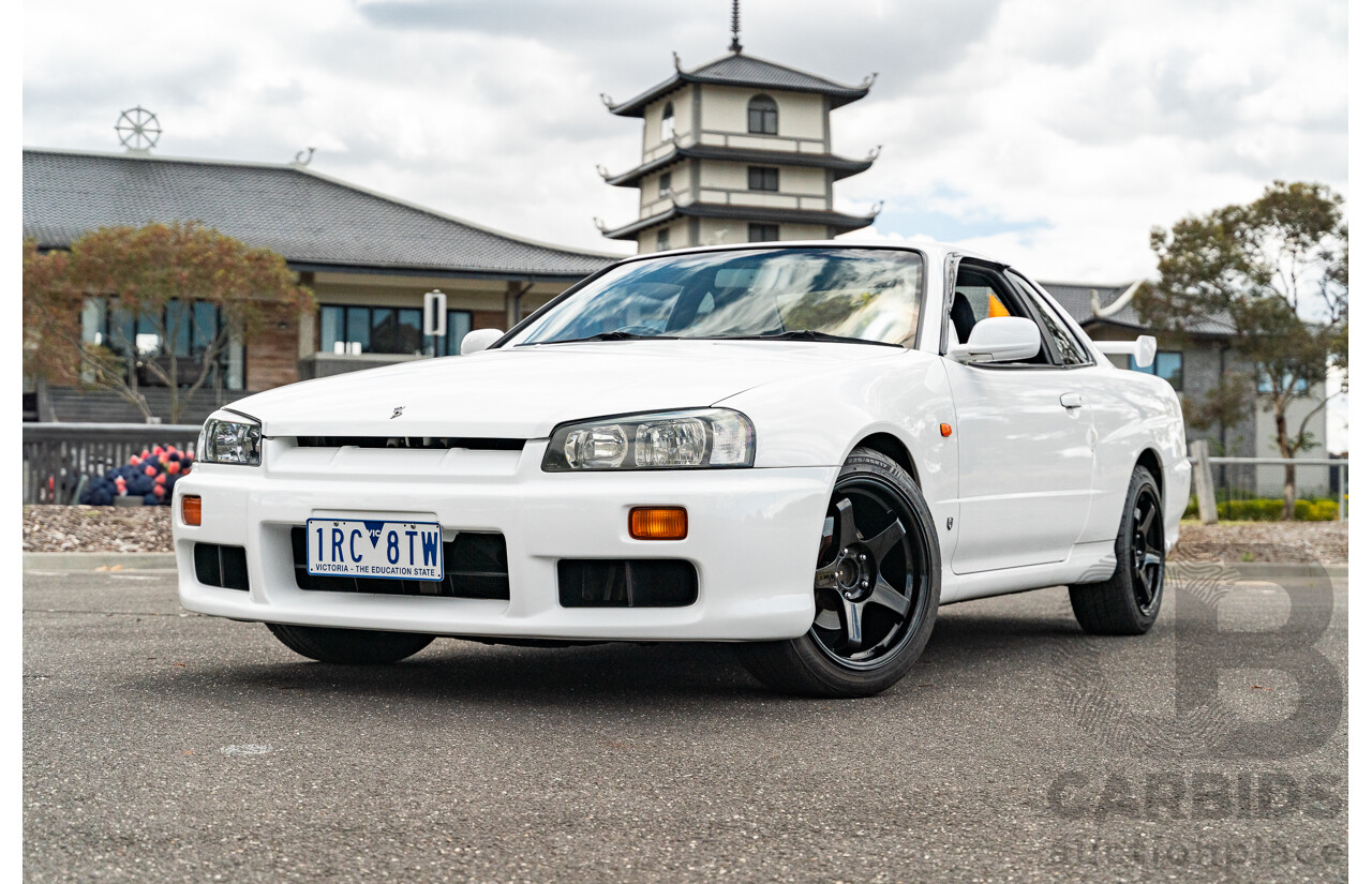 02/1999 Nissan R34 Skyline 25GT ER34 Series 1 2d Coupe QM1 White 2.5L - 04/2012 Import