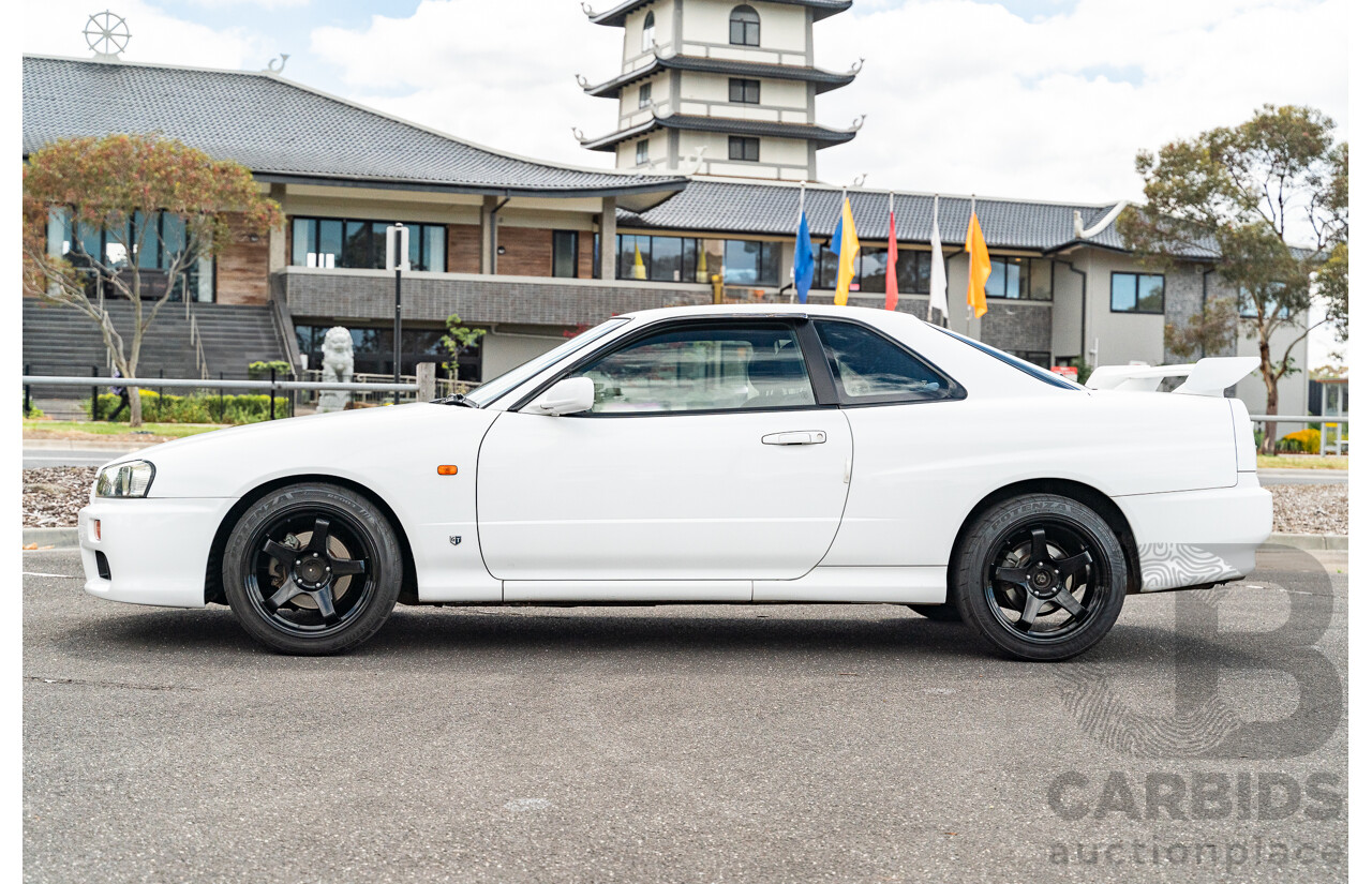 02/1999 Nissan R34 Skyline 25GT ER34 Series 1 2d Coupe QM1 White 2.5L - 04/2012 Import