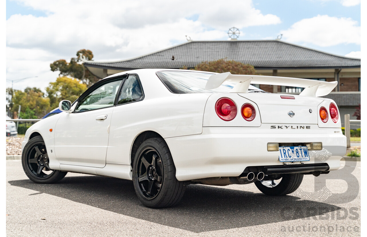 02/1999 Nissan R34 Skyline 25GT ER34 Series 1 2d Coupe QM1 White 2.5L - 04/2012 Import