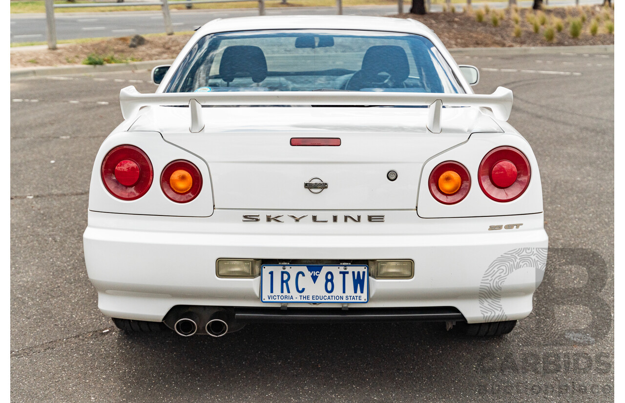 02/1999 Nissan R34 Skyline 25GT ER34 Series 1 2d Coupe QM1 White 2.5L - 04/2012 Import