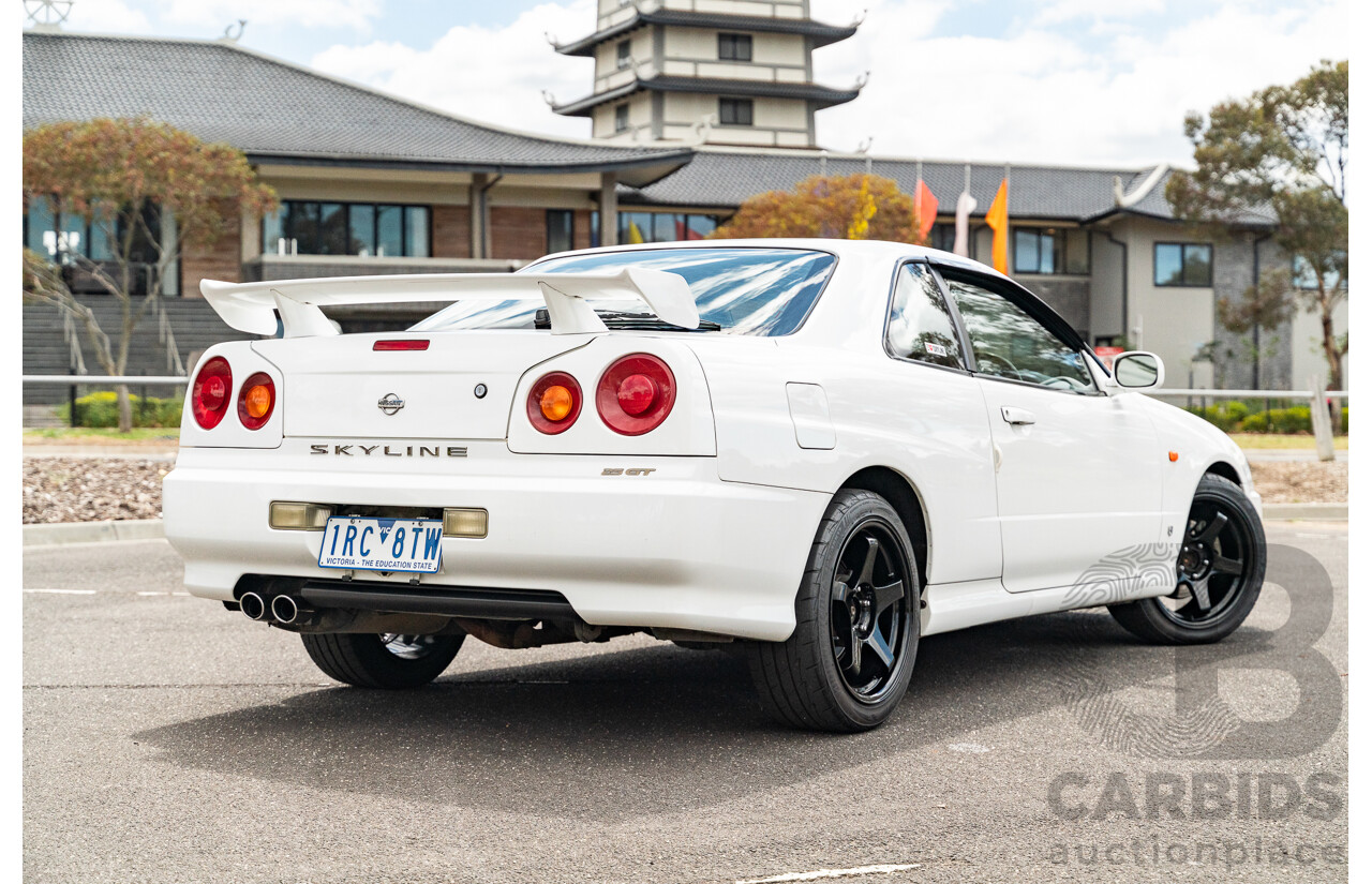 02/1999 Nissan R34 Skyline 25GT ER34 Series 1 2d Coupe QM1 White 2.5L - 04/2012 Import