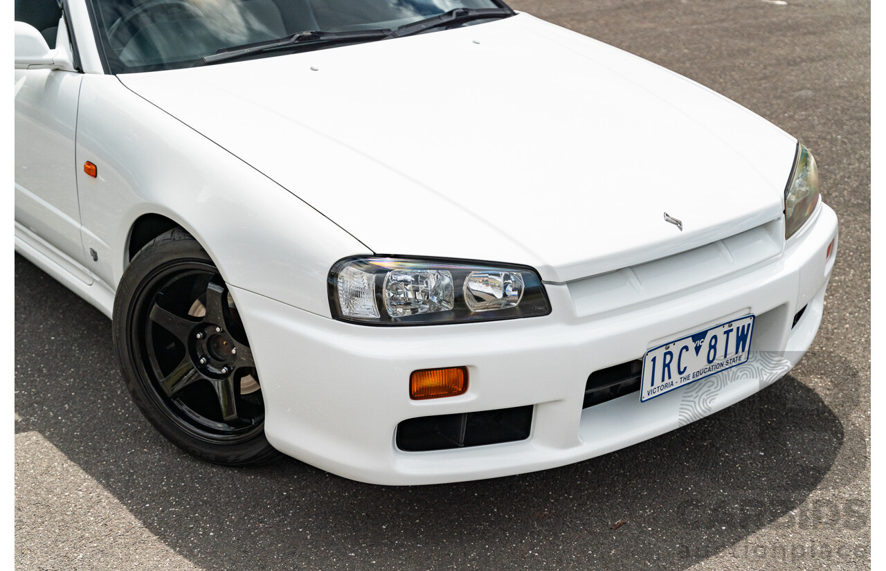 02/1999 Nissan R34 Skyline 25GT ER34 Series 1 2d Coupe QM1 White 2.5L - 04/2012 Import