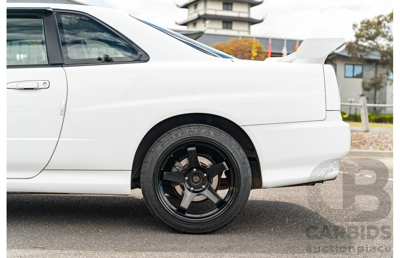 02/1999 Nissan R34 Skyline 25GT ER34 Series 1 2d Coupe QM1 White 2.5L - 04/2012 Import