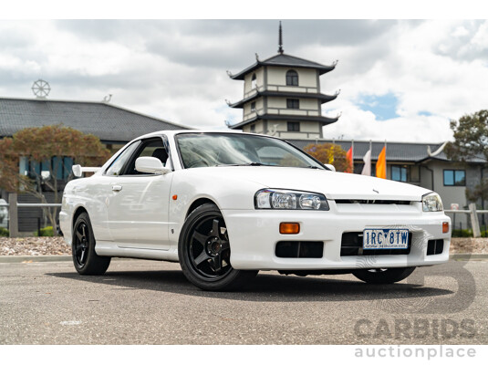 02/1999 Nissan R34 Skyline 25GT ER34 Series 1 2d Coupe QM1 White 2.5L - 04/2012 Import