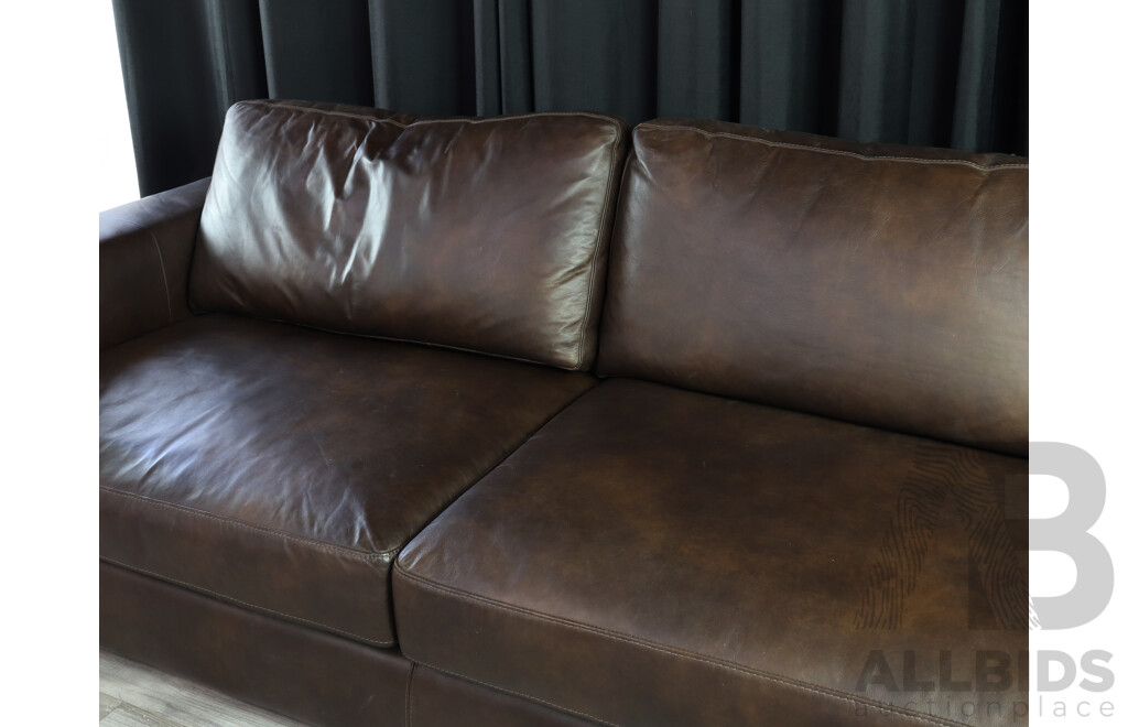 Pair of Brown Leather Modern Lounges