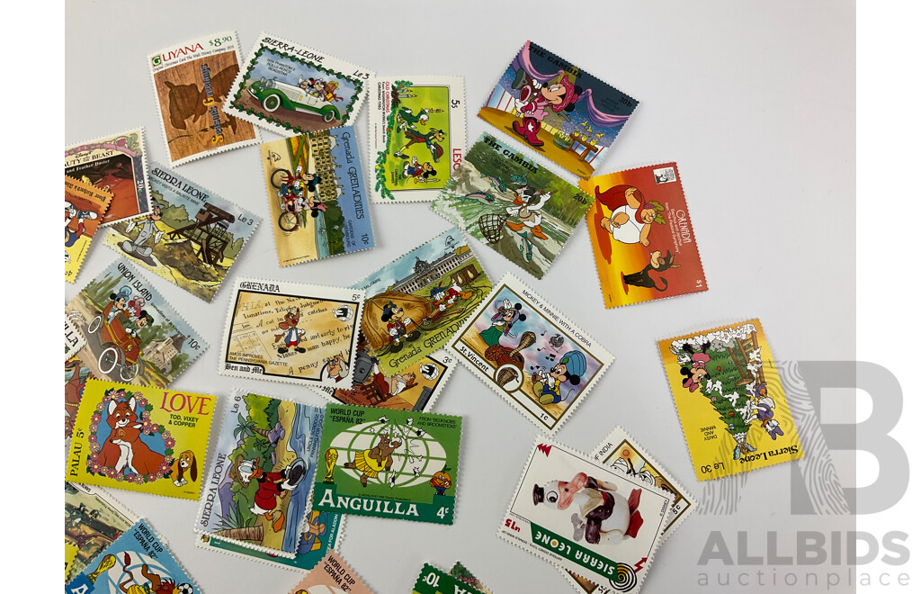 Assortment of International Disney Mint Stamps Including Guyana, India, Grenada, Sierra Leone and More