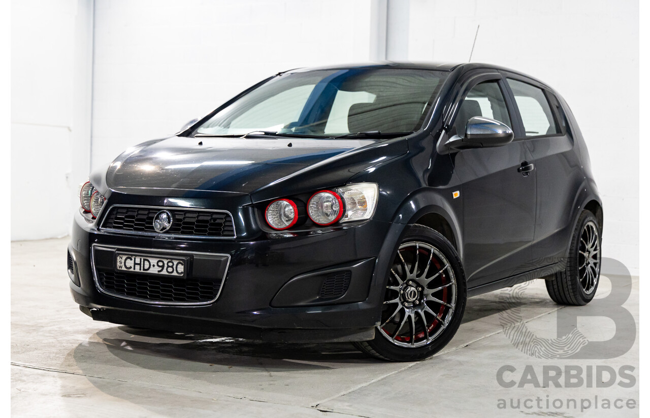 5/2012 Holden Barina  TM 5d Hatchback Carbon Flash Black Metallic 1.6L