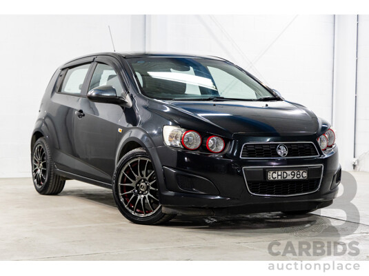 5/2012 Holden Barina  TM 5d Hatchback Carbon Flash Black Metallic 1.6L