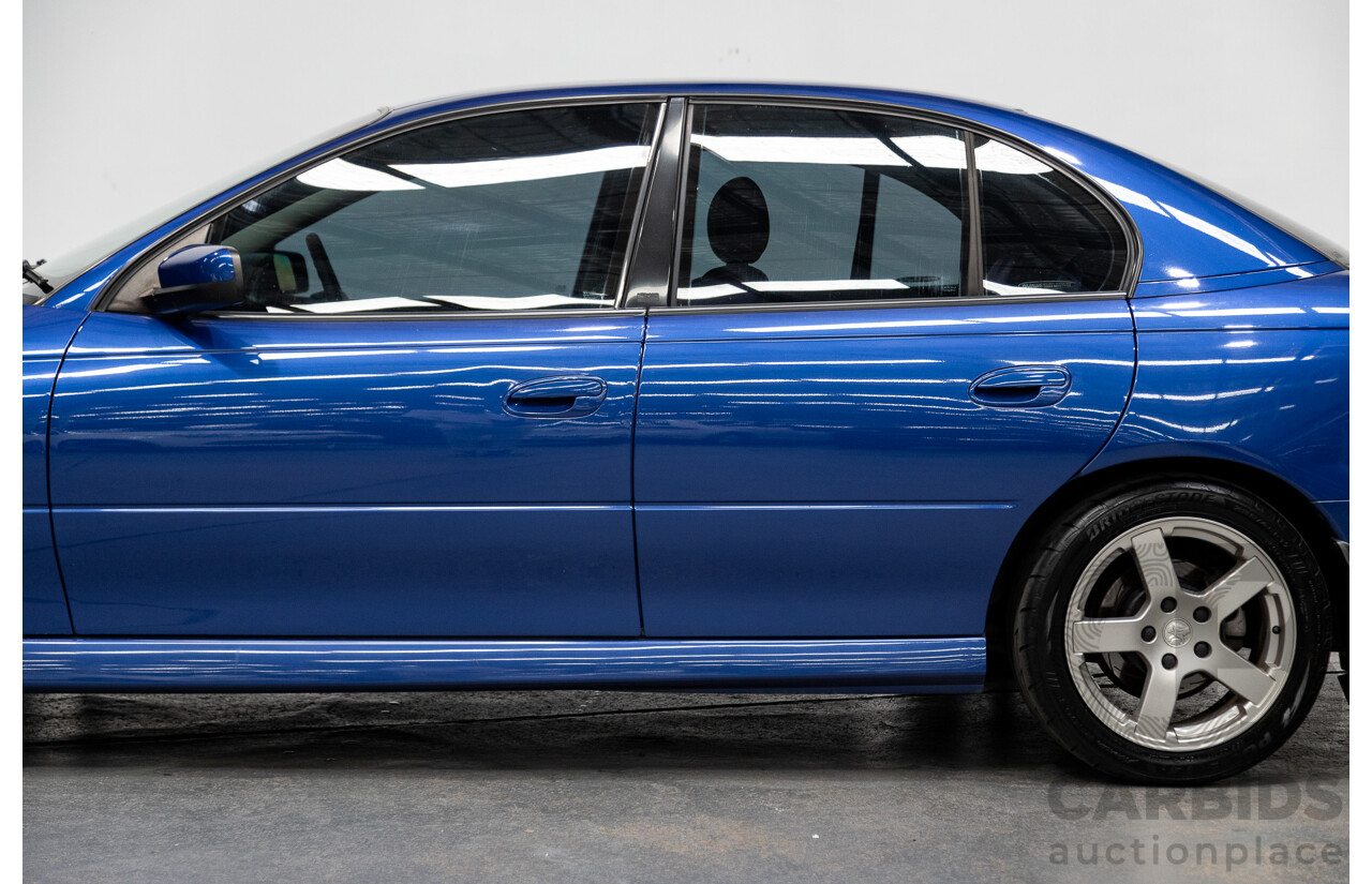 4/2005 Holden Commodore SV8 VZ 05 Upgrade 4d Sedan Impulse Blue Metallic V8 5.7L