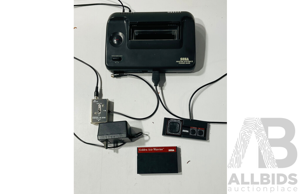 Vintage SEGA Master System II Power Base with Control Pad and Game Cartridge of Golden Axe Warrior