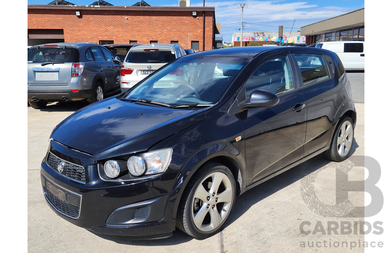 5/2012 Holden Barina  TM 5d Hatchback Black 1.6L