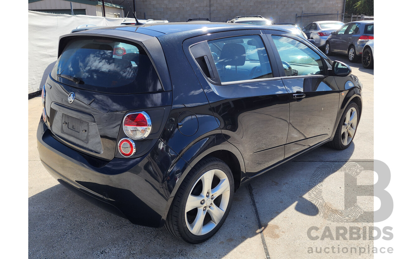 5/2012 Holden Barina  TM 5d Hatchback Black 1.6L