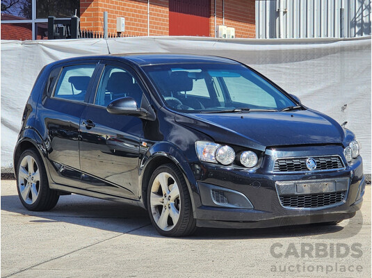 5/2012 Holden Barina  TM 5d Hatchback Black 1.6L