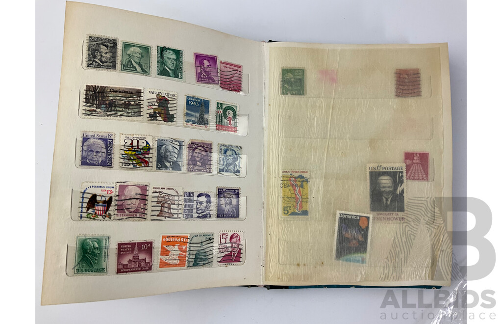 Four Albums of International Mint and Cancelled Stamps Including India, Germany, Rwanda, Australia, Cayman Islands, Magyar, USA, New Zealand, Fiji, Uruguay and More