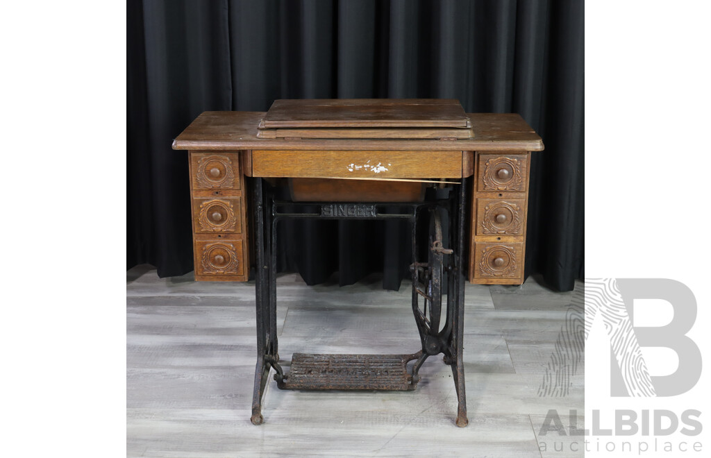 Singer Treadle Base Sewing Machine in Cabinet