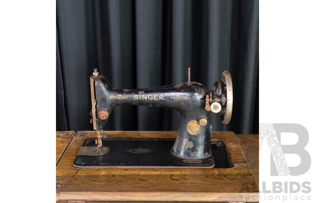 Singer Treadle Base Sewing Machine in Cabinet