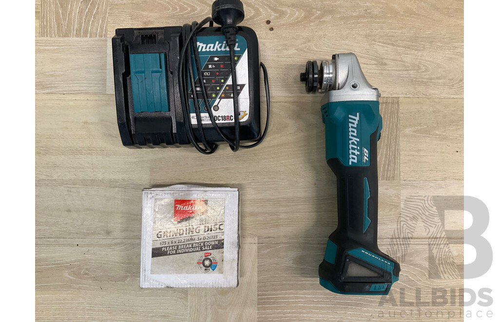 Makita 18V Brushless Angle Grinder DGA504 - Skin Only, Grinding Disc and Battery Charger - Lot of 3