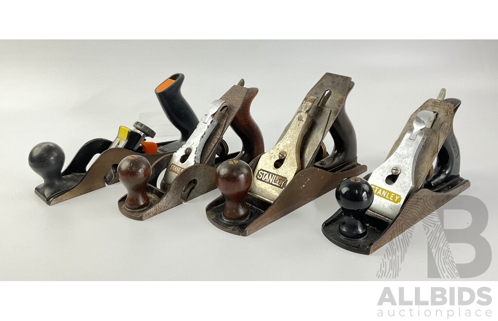 Three Vintage Stanley Bench Planes Including Number Four, Four and Half, Ten and Half, Twelve-one Hundred Universal