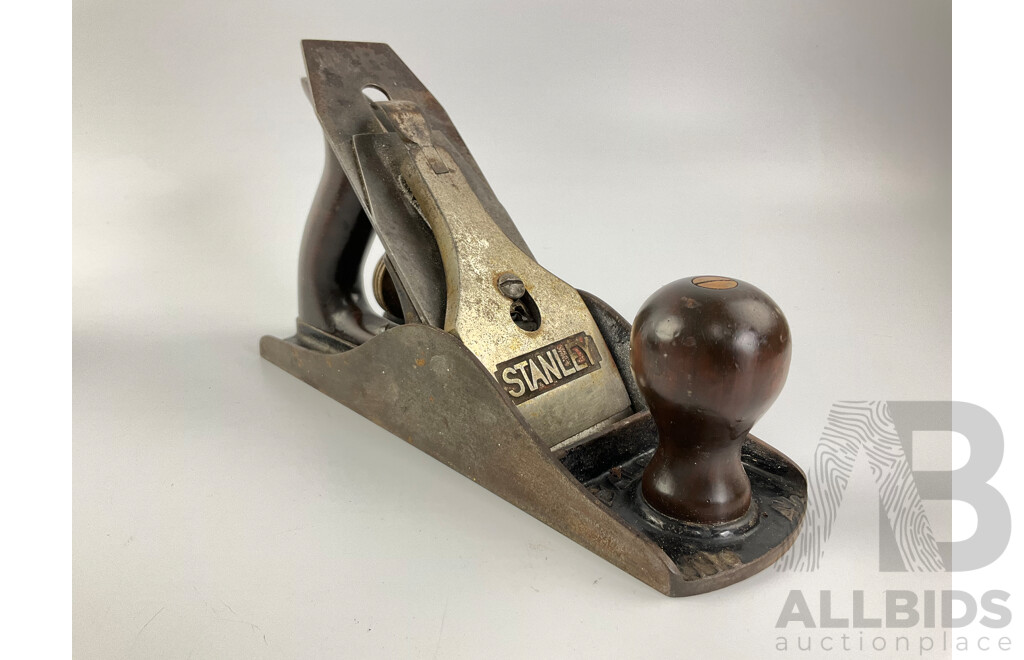 Three Vintage Stanley Bench Planes Including Number Four, Four and Half, Ten and Half, Twelve-one Hundred Universal