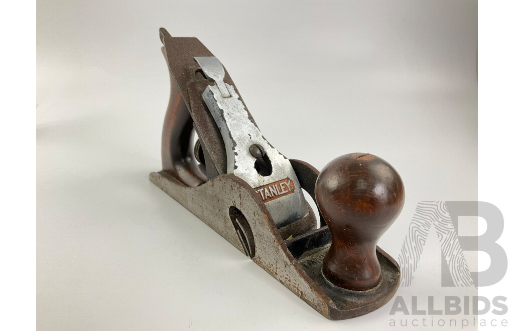 Three Vintage Stanley Bench Planes Including Number Four, Four and Half, Ten and Half, Twelve-one Hundred Universal