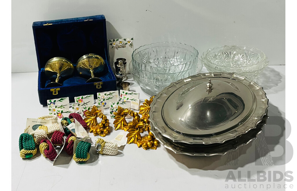 Collection Items Including Silver Plate Serving Dishes, Crsytal Serving Bowls, Brass Goblets in Case, Serviette Rings, Table Place Markers and More