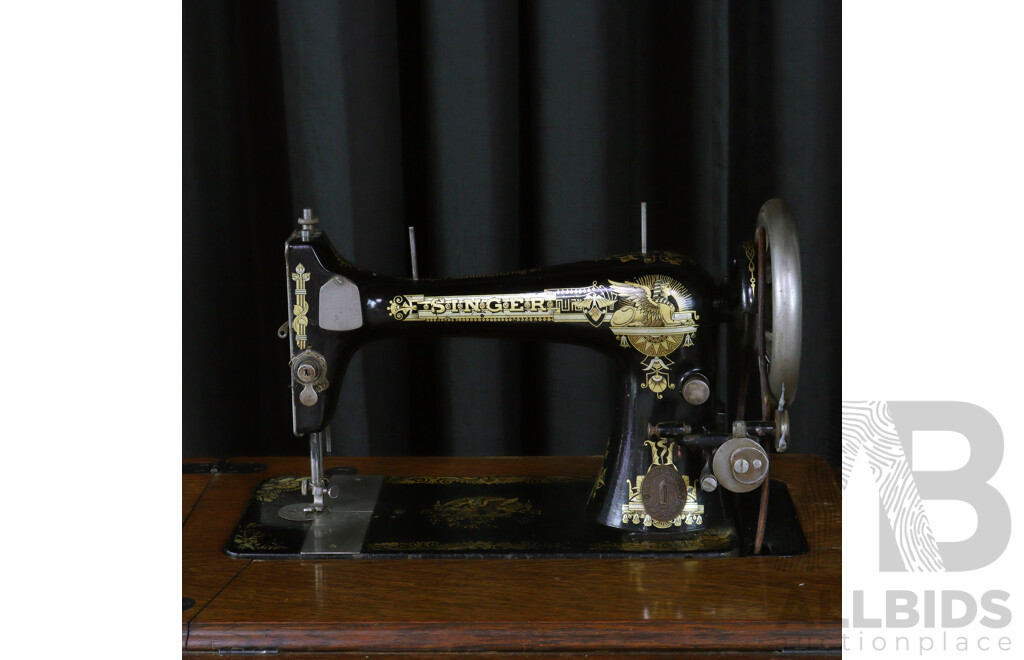 Vintage Singer Treadle Based Sewing Machine in Oak Case