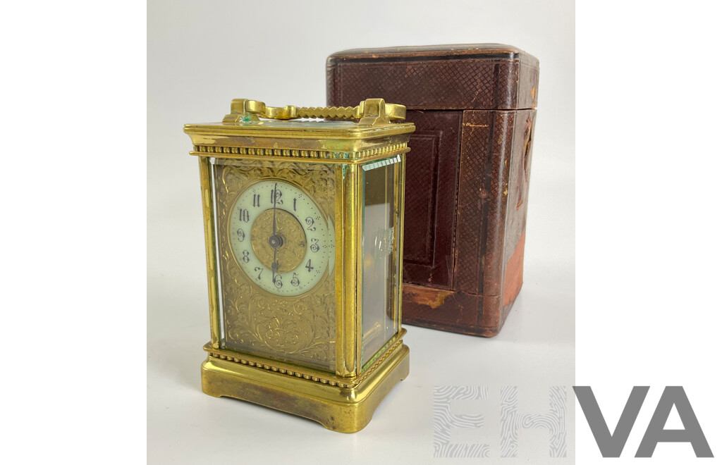 Antique Brass Traveling Clock, Ornate Floral Design with Beveled Glass and Case
