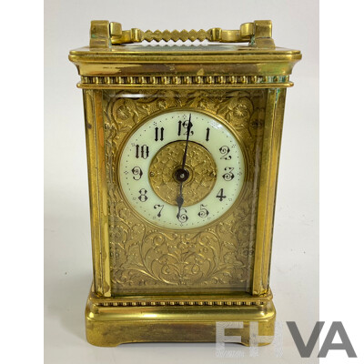 Antique Brass Traveling Clock, Ornate Floral Design with Beveled Glass and Case
